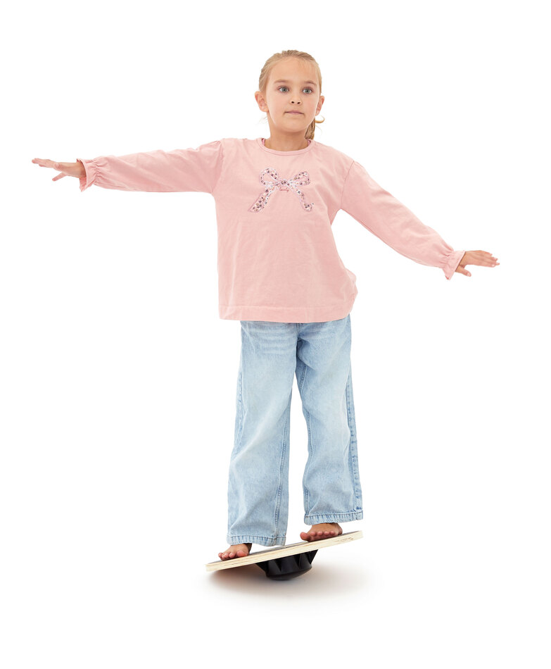 Balance-Kreisel mit Mädchen